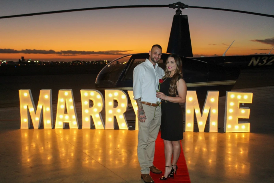 Romantic helicopter proposal flight at night